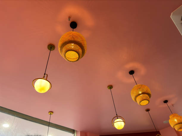 istock A series of hanging lights with a yellow glow 2188299711