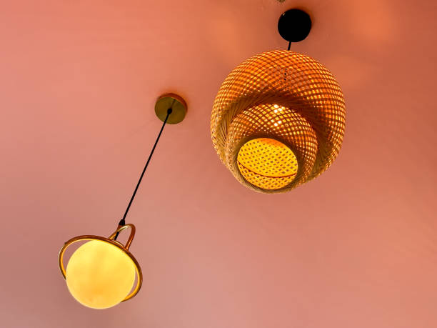 istock A series of hanging lights with a yellow glow 2188299719
