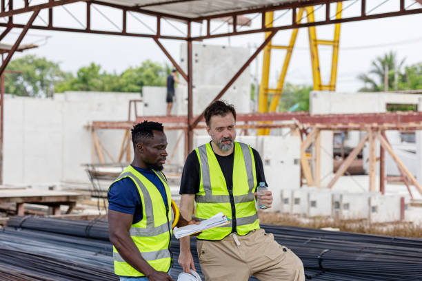istock Partnership between cultures in a factory 2188299962