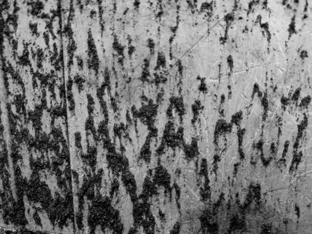 Abstract background texture of a plastic covered in sand in close up, Rough background texture