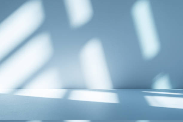 istock Studio style background wall decoration presentation uses white and blue tones. with shadows cast from a nearby window, concept creating a decorative 2188306353