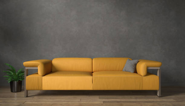 istock 3d rendering of a black mock up wall with orange sofa. 2188308210