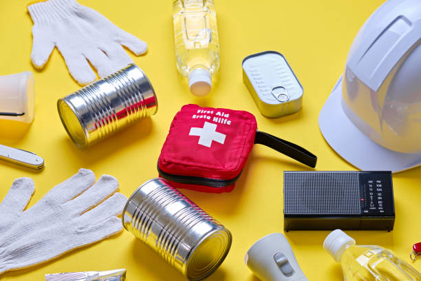 istock Disaster preparedness kit on yellow background. 2188309242