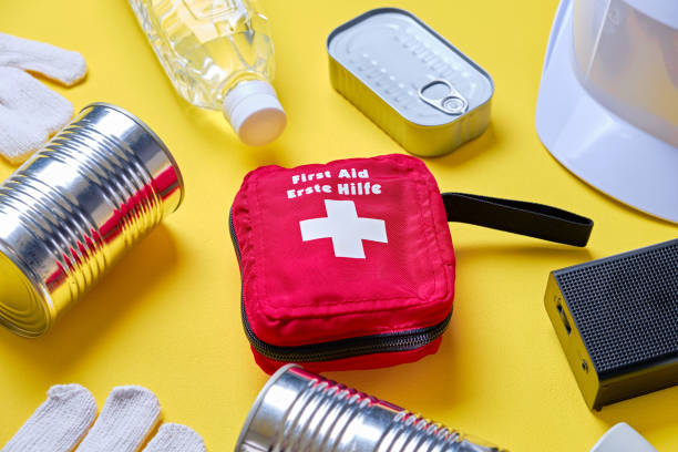 istock Disaster preparedness kit on yellow background. 2188309298