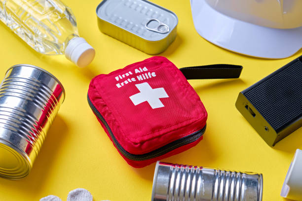 istock Disaster preparedness kit on yellow background. 2188309350