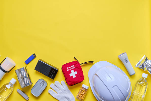 istock Disaster preparedness kit on yellow background. 2188309352