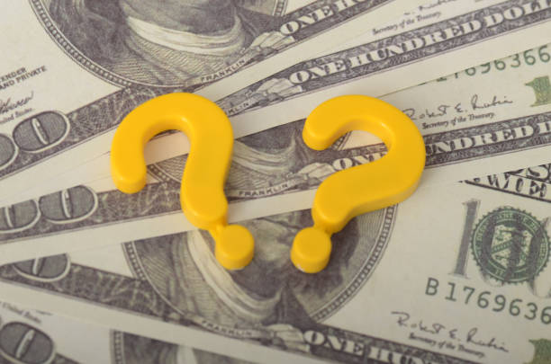 istock Understanding Financial Uncertainty: Question Mark and USD Money Background Symbolizing Economic Decisions 2188310641