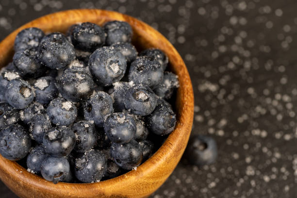 istock sprinkled with white sweet sugar juicy blueberry berries 2188311376