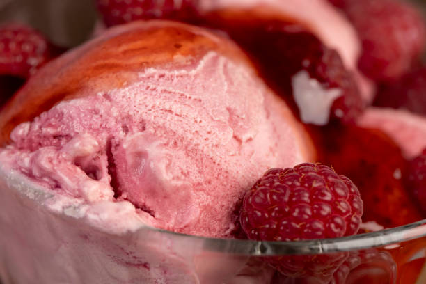 istock red raspberry ice cream in a glass bowl with raspberry jam 2188311387