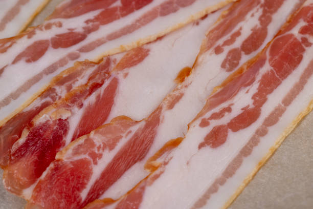 istock fresh thinly sliced pork bacon with meat and bacon 2188311428