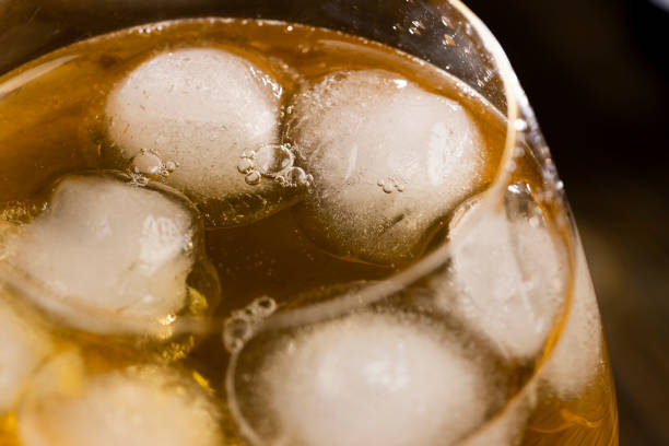 istock transparent glass with cold apple juice with ice 2188311500