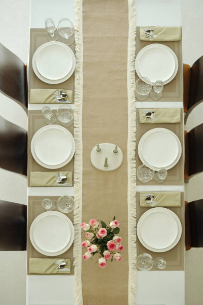 istock Elegant Dining Table Setting with Floral Centerpiece 2188315070