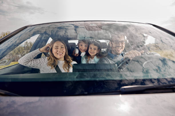istock Happy family going on a vacation by car. 2188318398