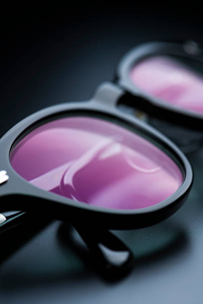 Close-up of eyeglass lenses on a black background