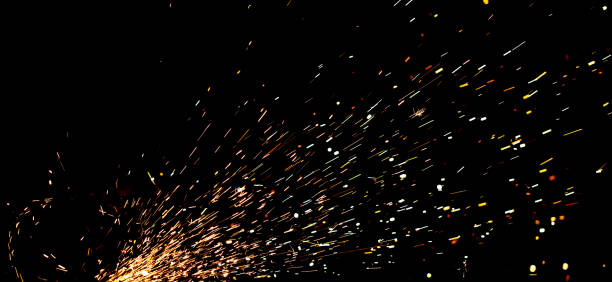 istock A black background with a lot of sparks and fire 2188319140