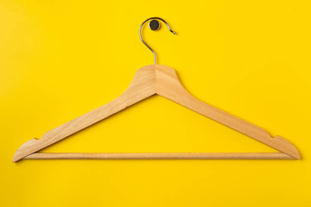 istock Hanger on colored paper background. Minimalistic fashion concept. 2188319557