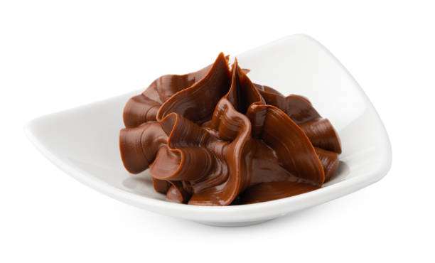 istock Bowl of chocolate cream isolated on white background 2188324437