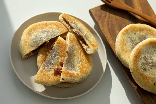 istock hotteok, Korean Syrup filled Pancake 2188325948