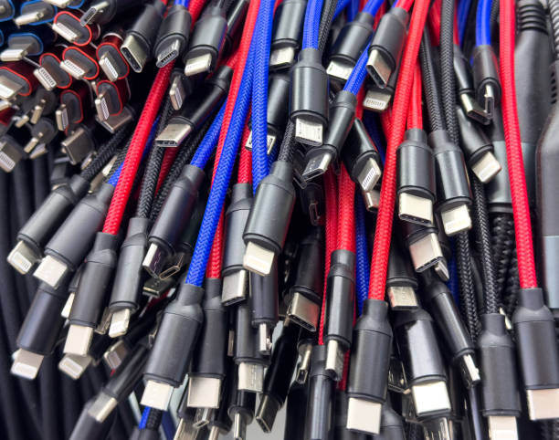 istock Different types of charger connectors for phones texture background. Charging or data cables. 2188326240