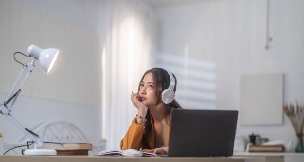 istock Focused Woman on Laptop for Remote Learning and Working 2188326275