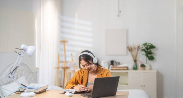 istock Focused Woman on Laptop for Remote Learning and Working 2188326308