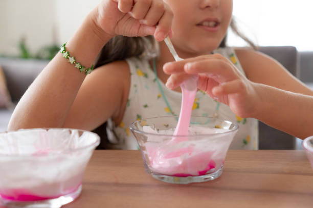 istock Girl playing with sticky slime 2188326839