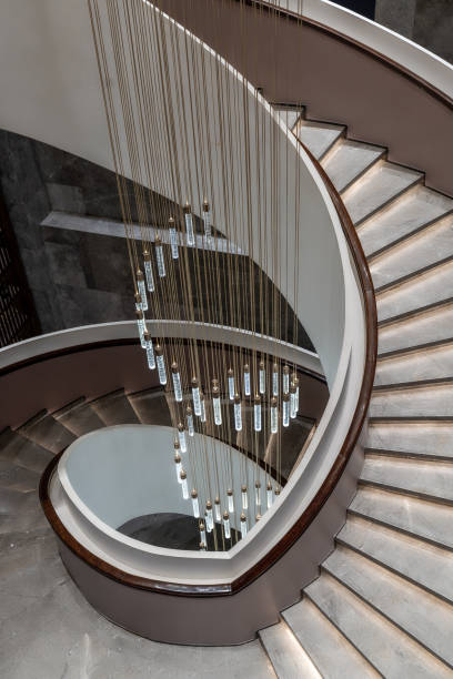 istock Rotating stairs and chandeliers in the hotel 2188326896