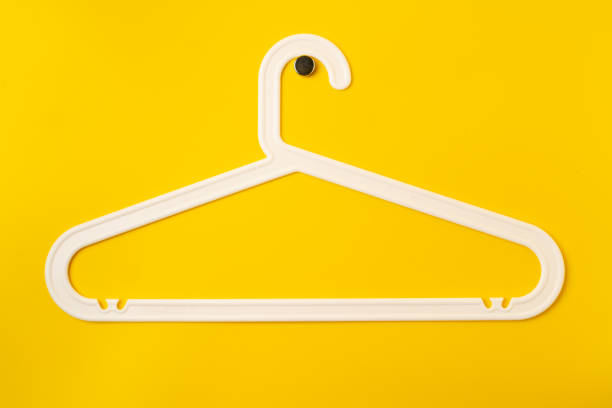 istock Hanger on colored paper background. Minimalistic fashion concept. 2188327992