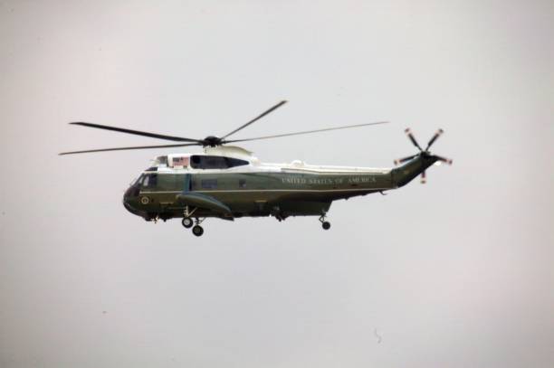 Helicopter Agusta-Westland AW139 PH-PXY of the Dutch Police Aviation Service fitted with camera's for surveillance. The Helicopter is flying in mid air and searching for burglars after a breaking and entering in Kampen, The Netherlands.
