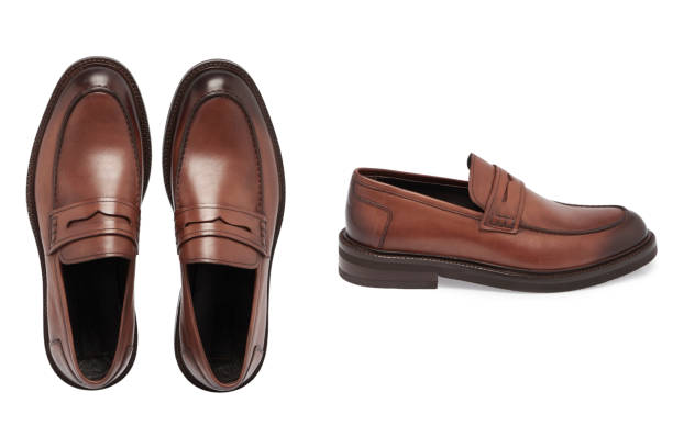 istock Brown Leather Men's Shoes On White Background 2188332544