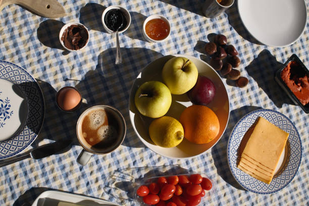 breakfast on a red tablecloth on the background of the ocean. High quality photo