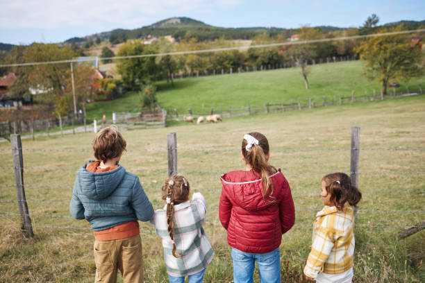 istock Kids at the farm 2188333492