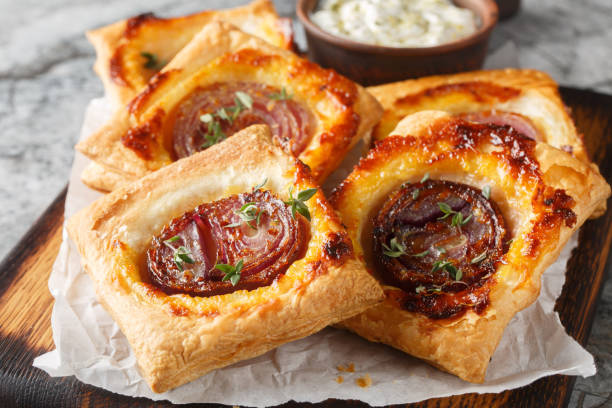 istock Savoury Roast Onion Upside-Down Cakecloseup on the wooden board. Horizontal 2188333780