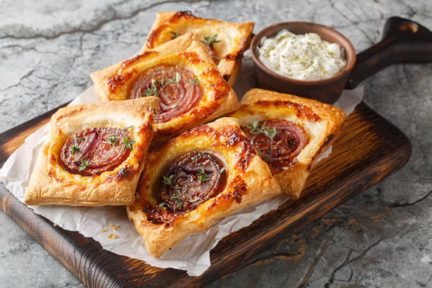 istock Homemade Upside Down Caramelized Onion Pie Close Up on Wooden Board. Horizontal 2188333809