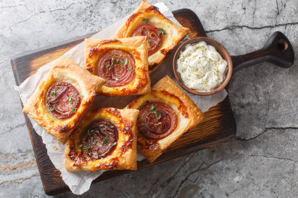 istock Homemade Upside Down Caramelized Onion Pie Close Up on Wooden Board. Horizontal top view 2188333821
