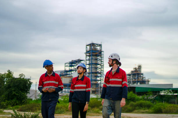 istock Blue collar workers are working at industrial site. 2188333858