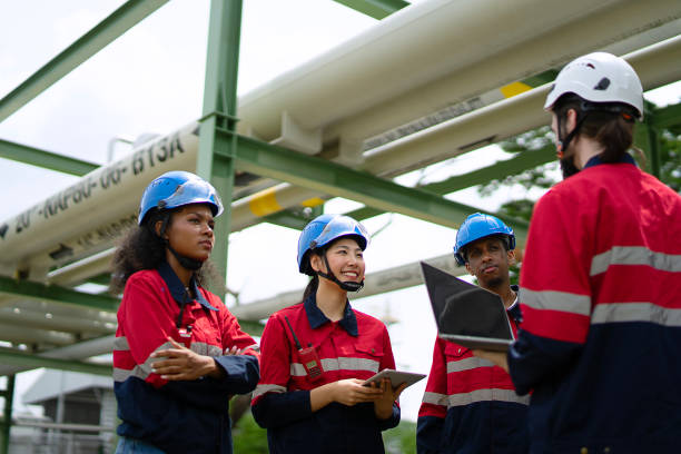 istock Blue collar workers are working at industrial site. 2188333859