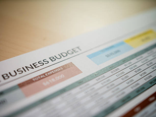 istock Business budget planning document financial report for office space management strategy 2188334112