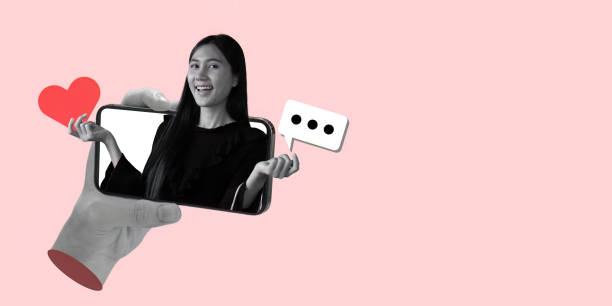 istock Joyful Woman Engaging in Online Communication with Heart Icon 2188335912