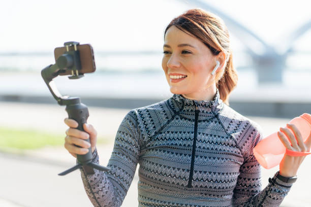 istock A female influencer recording sport vlog 2188337852