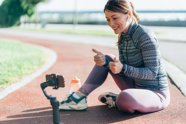 istock A female influencer recording sport vlog 2188337863