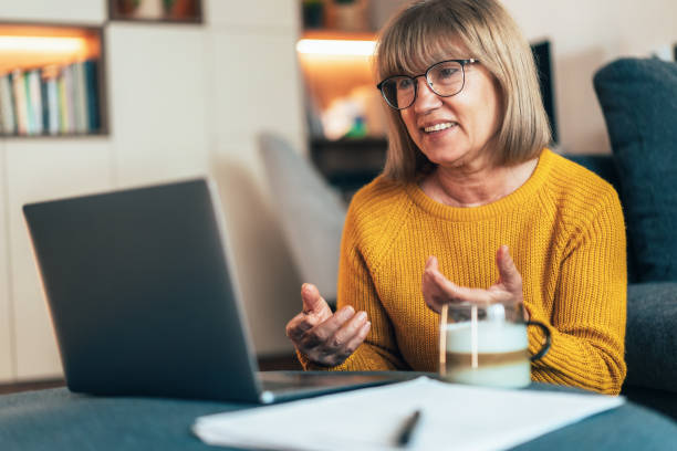istock Senior woman having video call 2188337868