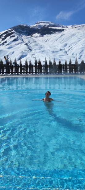 istock woman in hot pool 2188339208