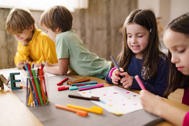 istock Children draw with felt tip pen in living room 2188339227