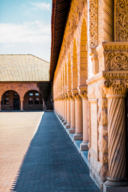 istock Elegant Architectural Design of Stone Arches and Columns in Sunlit Courtyard Reflecting Historical and Cultural Heritage 2188346151