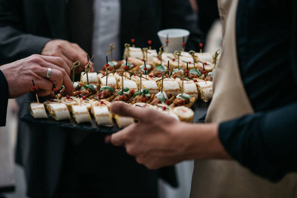 istock Waiter Serving Gourmet Appetizers At Luxury Wedding Reception 2188347617