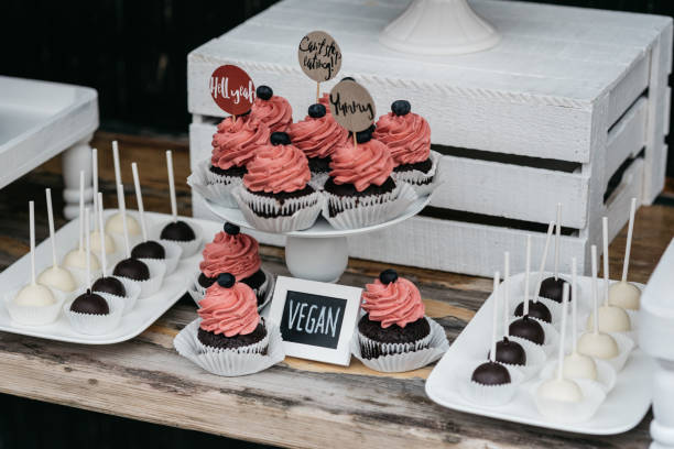 istock Vegan Chocolate Cupcakes and Cake Pops on Rustic Dessert Table 2188347952
