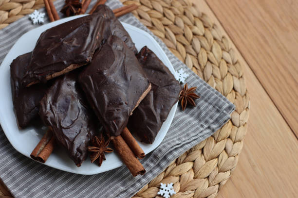 istock Italian traditional festive cookies called Mostaccioli or Mustaccioli on a plate on gray tablecloth on table 2188353045
