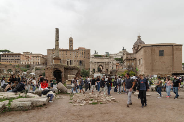 Rome, Italy - October 16, 2024: Roman forum in Rome with a multitude of tourists visiting this place every day