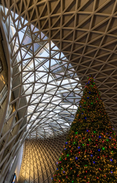 istock Christmas tree and elaborate ceiling in King's Cross Station London 2188354968